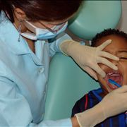 Picture Of Dentist Fluor Application